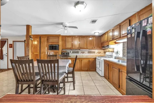 a view of a livingroom with furniture and window