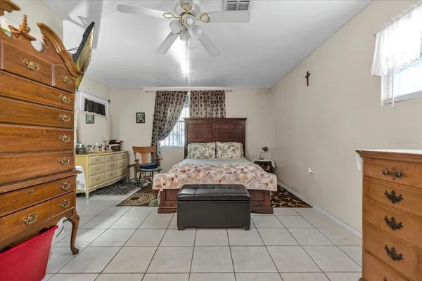 a room with a bed and furniture