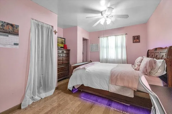 a kitchen with a sink and mirror