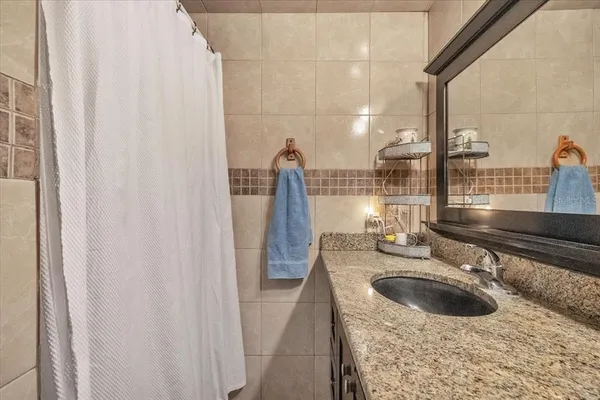 a view of a chairs and table in the patio