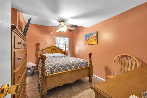 a bathroom with a shower a toilet and sink