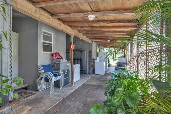 a backyard of a house with seating space