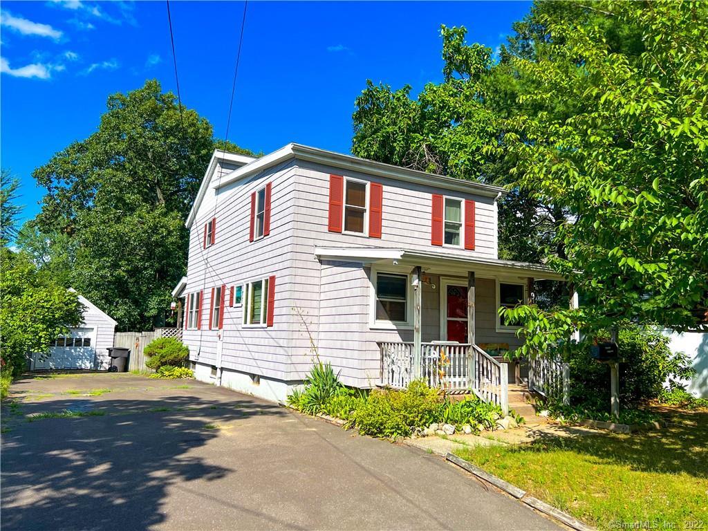 9 Booth Road Enfield, CT 06082 - Photo 1 of 1 a front view of a house with a garden