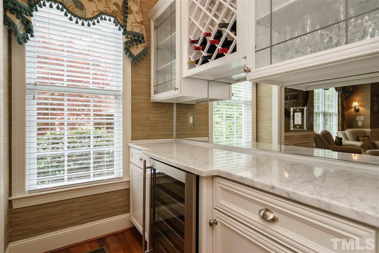 1117 Hobson Court Raleigh, NC 27607 - Photo 14 of 25 a view of a kitchen with a sink and large window