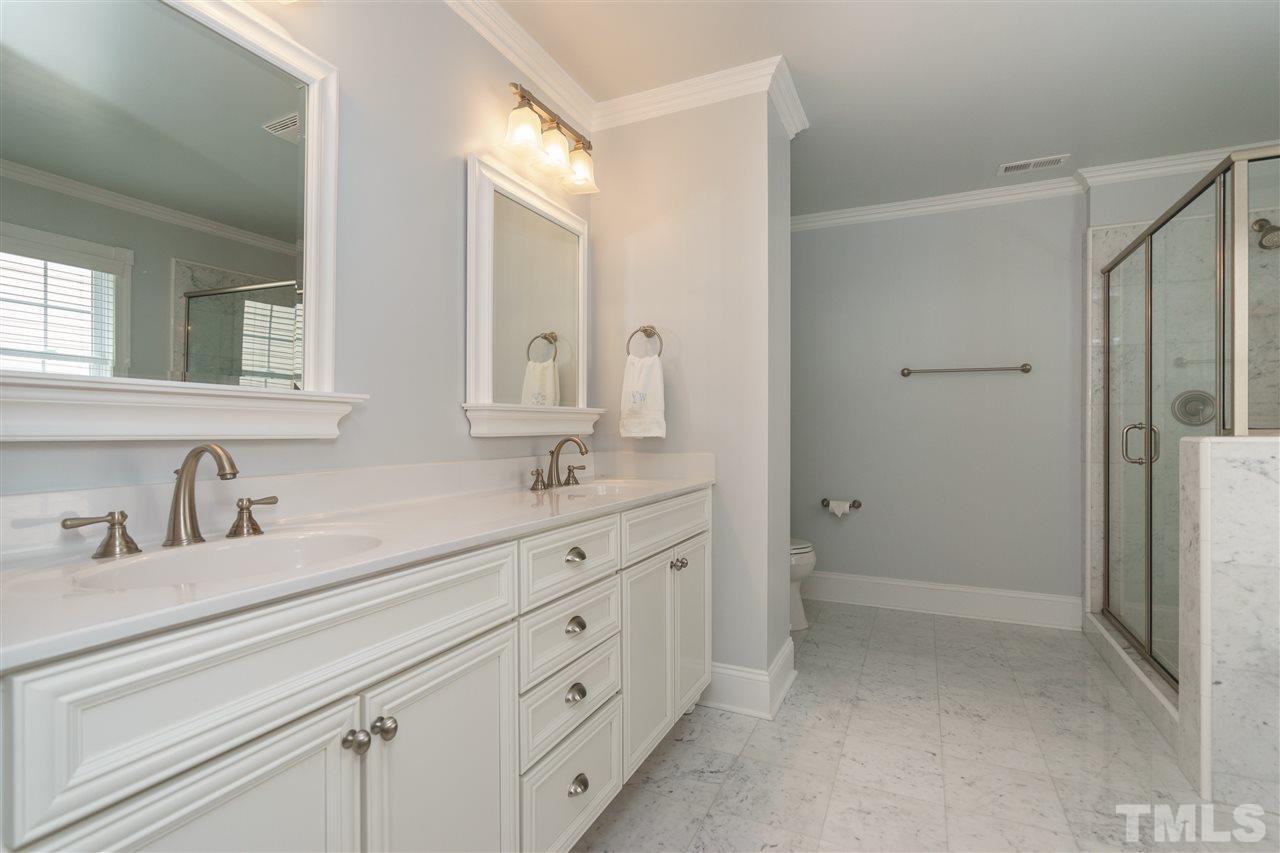 1117 Hobson Court Raleigh, NC 27607 - Photo 17 of 25 a bathroom with a granite countertop sink mirror and double