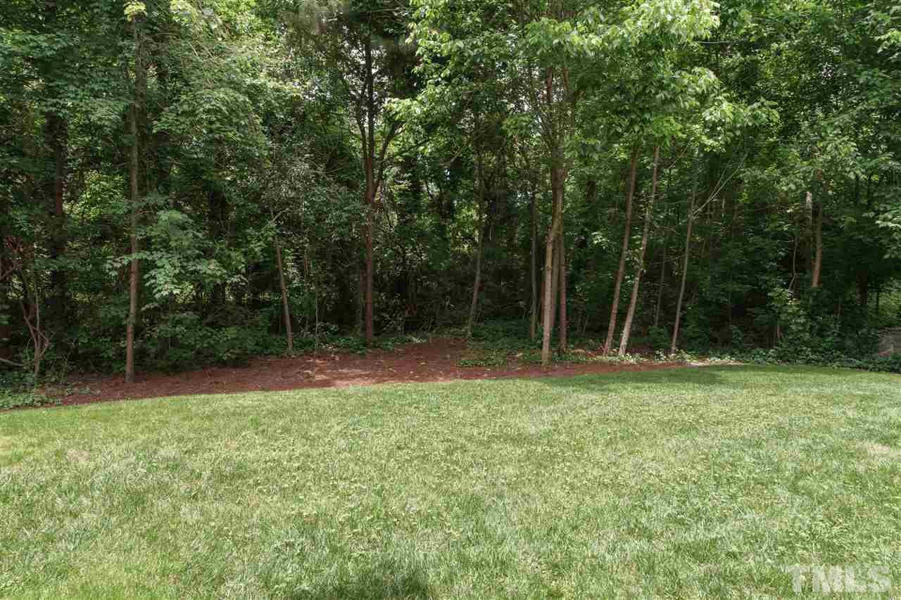 1117 Hobson Court Raleigh, NC 27607 - Photo 22 of 25 a view of outdoor space with deck and yard