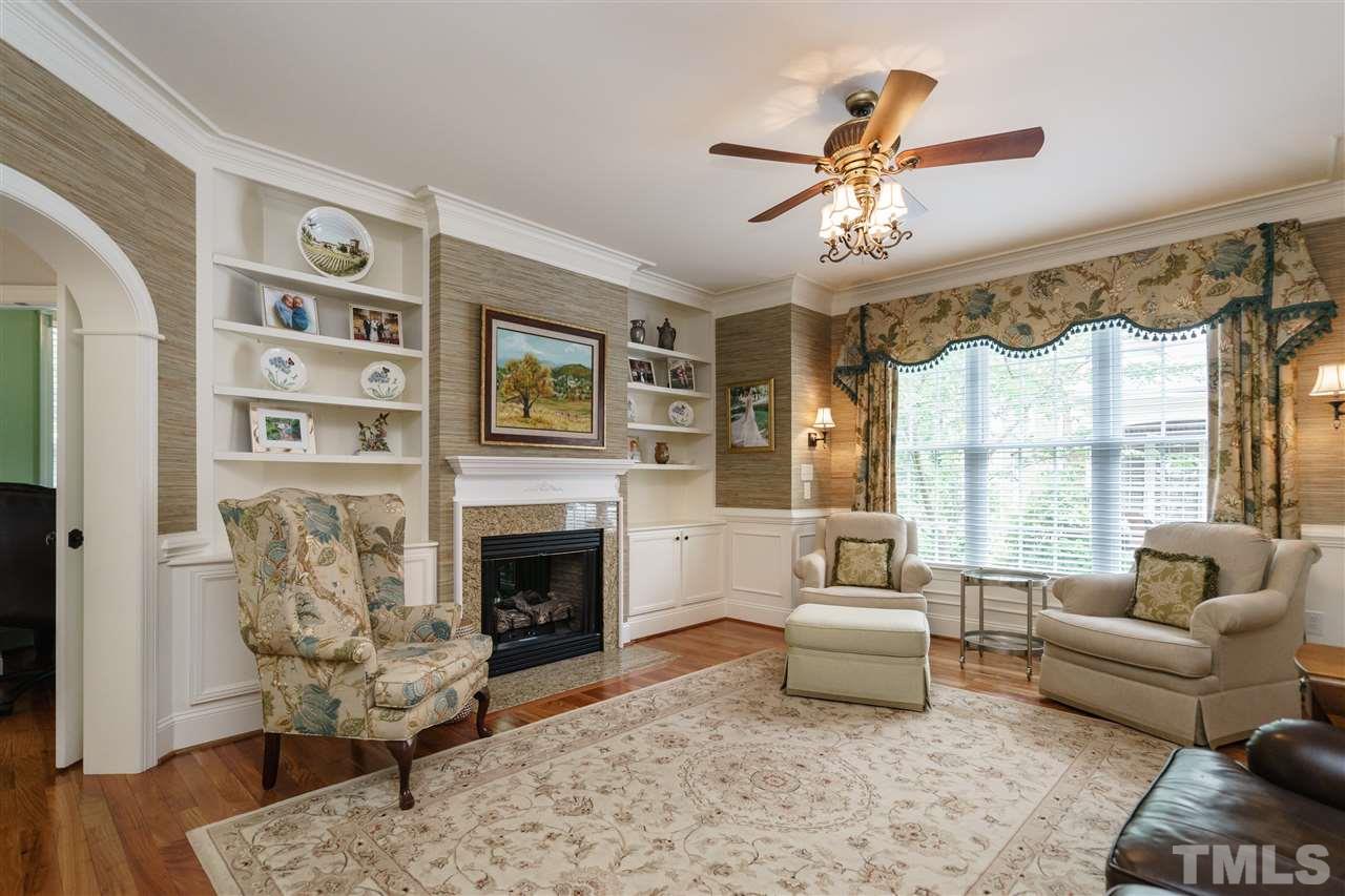 1117 Hobson Court Raleigh, NC 27607 - Photo 4 of 25 a living room with furniture and a fireplace