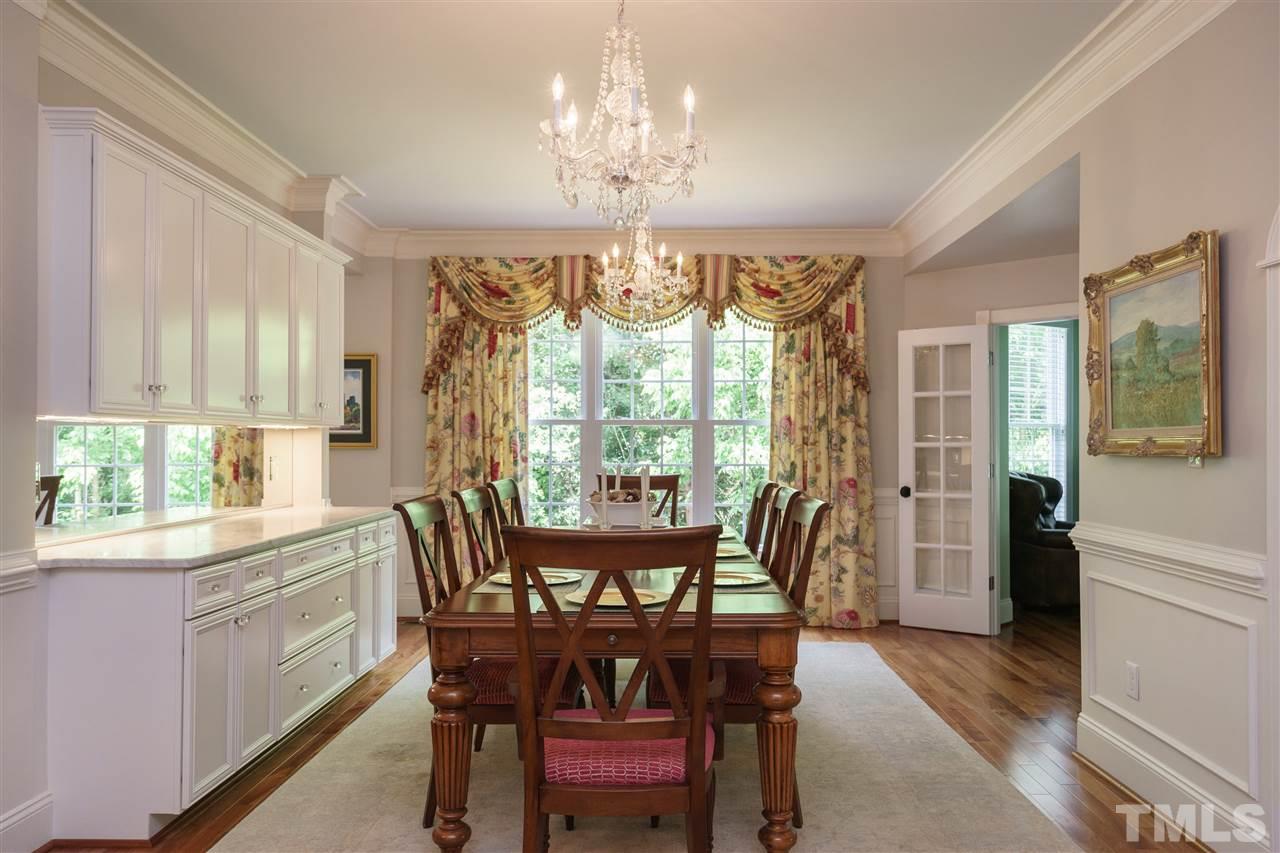 1117 Hobson Court Raleigh, NC 27607 - Photo 7 of 25 a view of a dining room with furniture window and outside view