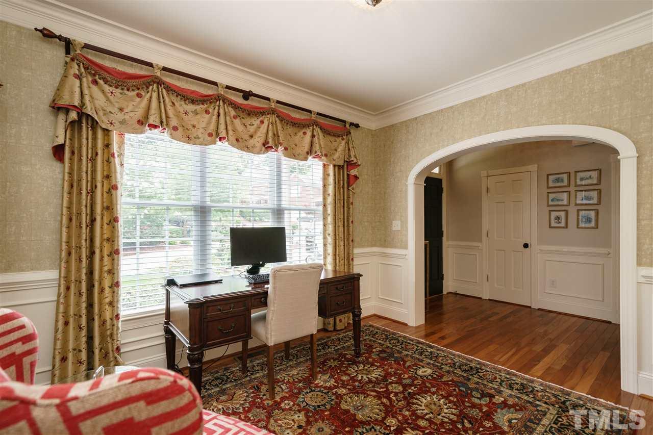 1117 Hobson Court Raleigh, NC 27607 - Photo 10 of 25 a workspace with wooden floor and a window