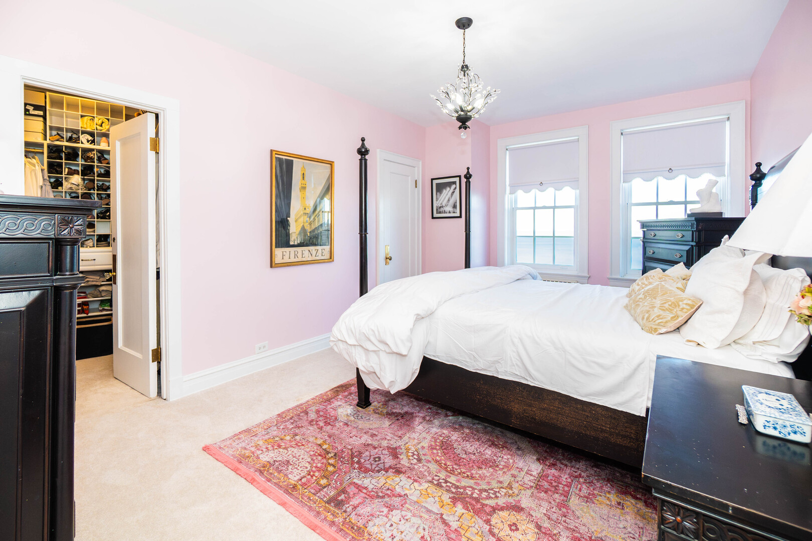 1120 North Lake Shore Drive, Unit 15A Chicago, IL 60611 - Photo 12 of 29 a bedroom with a bed wooden floor and window