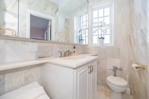 a bathroom with a sink and a toilet