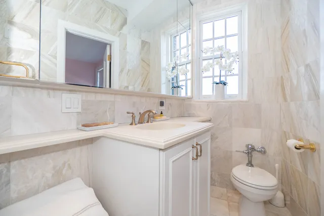 a bathroom with a sink and a toilet