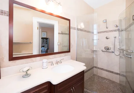 a bathroom with a sink and a mirror
