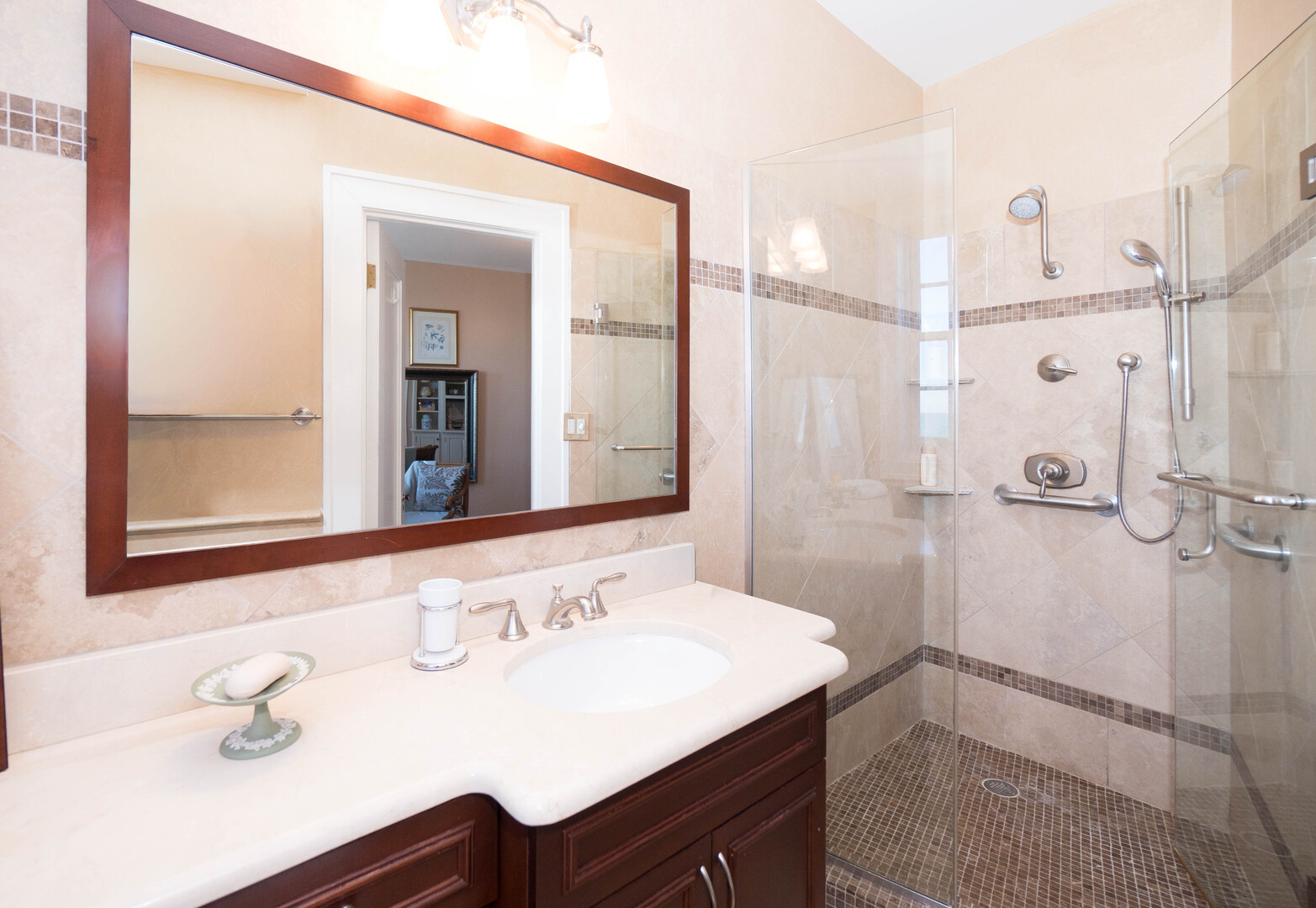 1120 North Lake Shore Drive, Unit 15A Chicago, IL 60611 - Photo 19 of 29 a bathroom with a sink and a mirror
