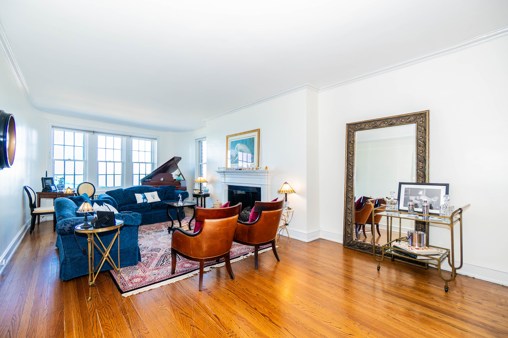 1120 North Lake Shore Drive, Unit 15A Chicago, IL 60611 - Photo 4 of 29 a living room with furniture and a wooden floor