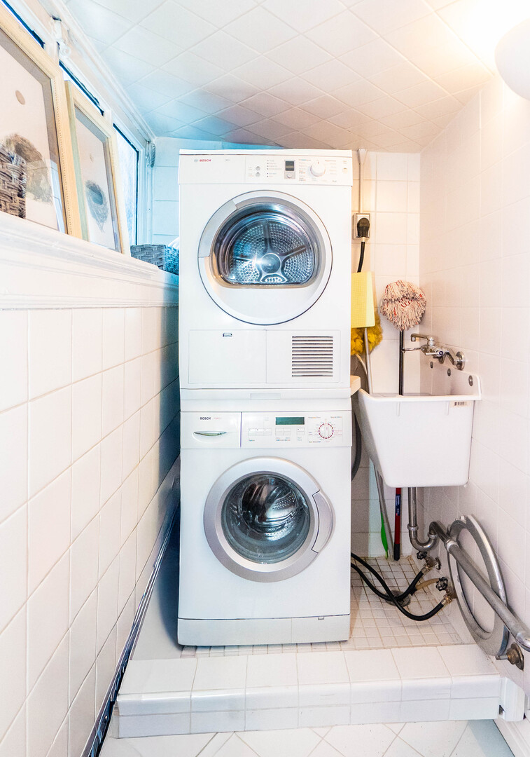 1120 North Lake Shore Drive, Unit 15A Chicago, IL 60611 - Photo 8 of 29 a utility room with sink dryer and washer