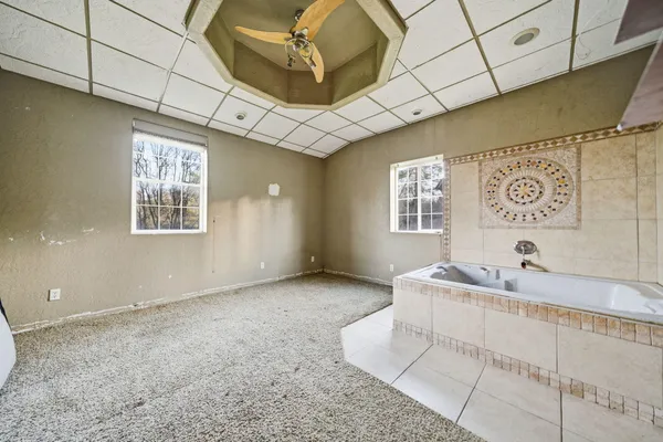 a kitchen with a sink and a refrigerator