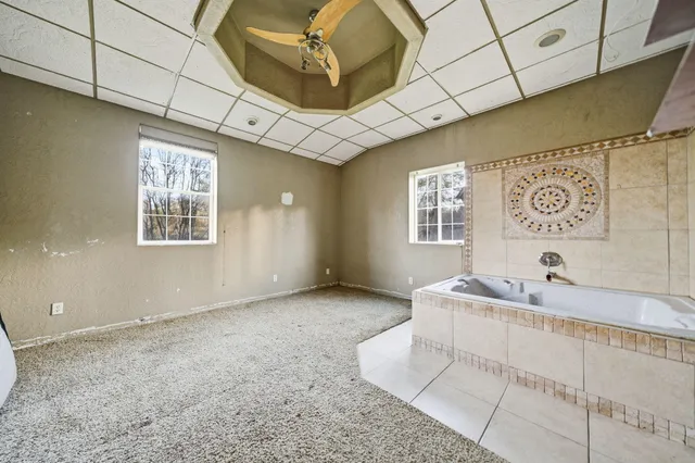 a kitchen with a sink and a refrigerator
