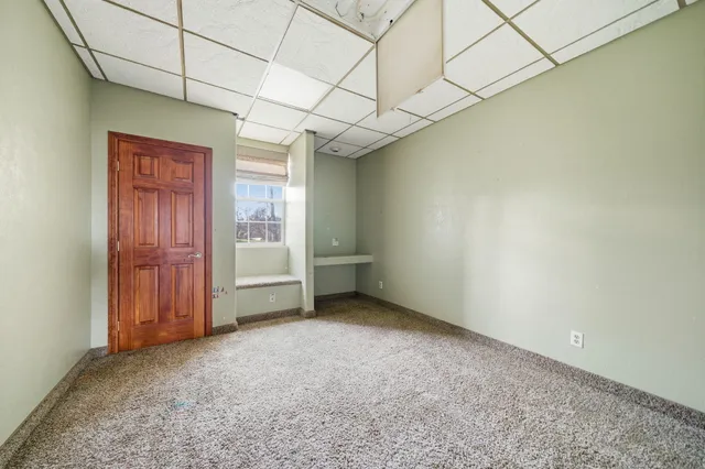 a view of livingroom with an empty room