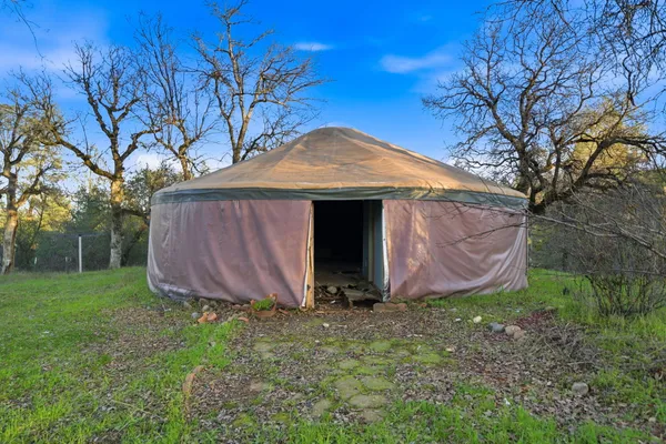 a fire hydrant in the middle of a field