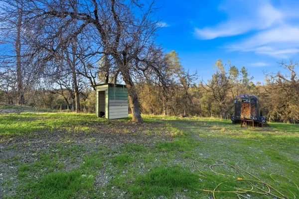 a view of a backyard of a house