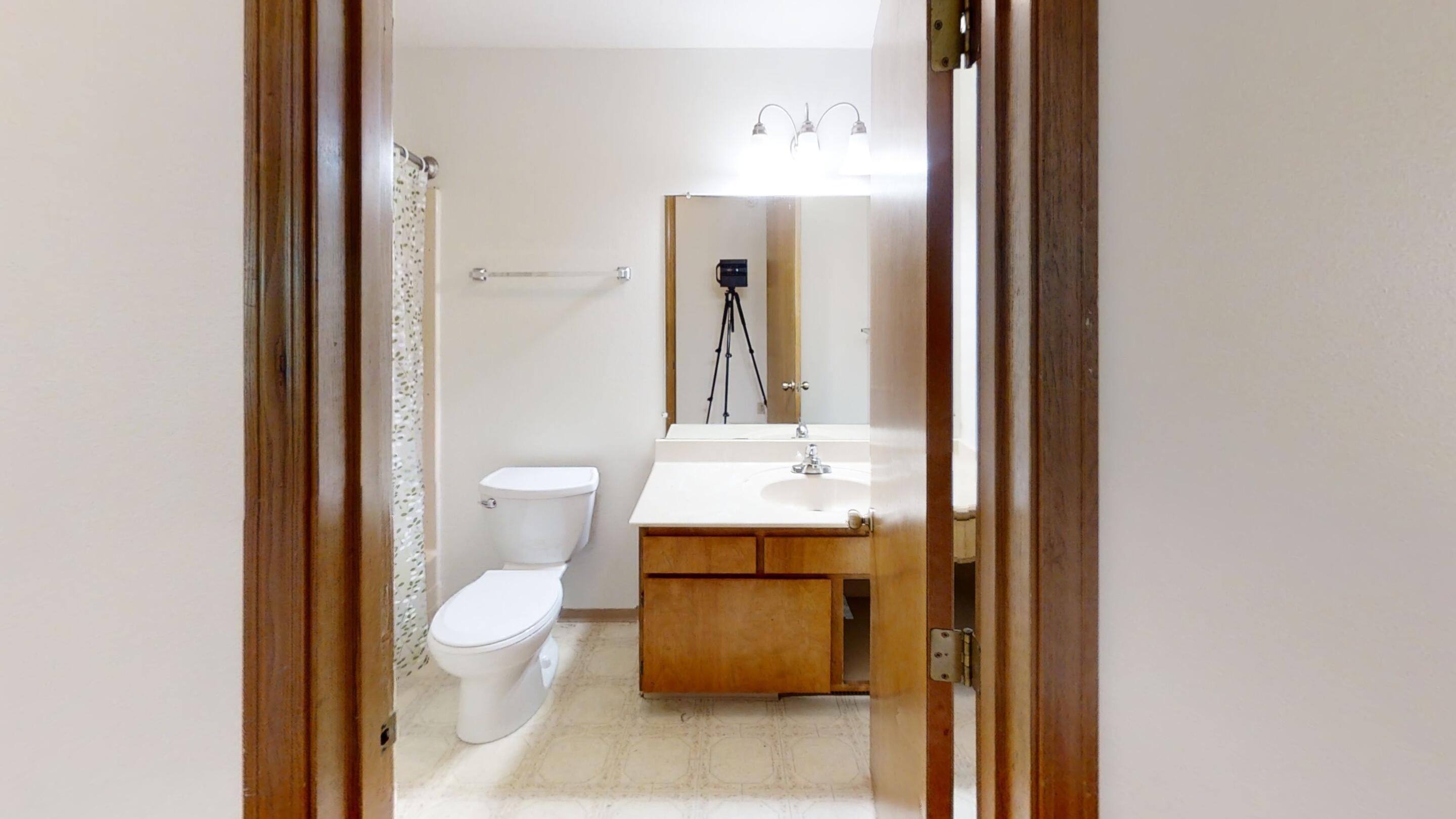 4748 Upper Applegate Road Jacksonville, OR 97530 - Photo 22 of 31 a bathroom with a toilet sink and mirror