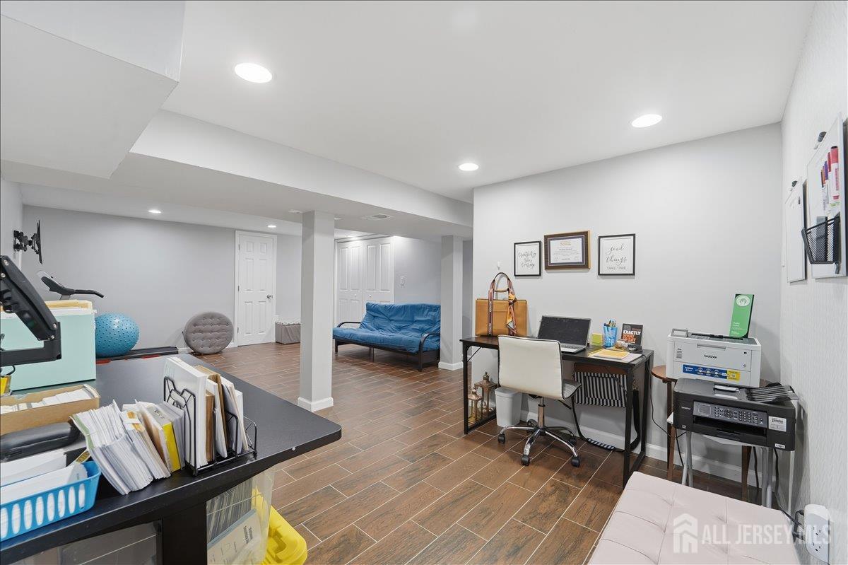 10 Maplehurst Lane Piscataway, NJ 08854 - Photo 22 of 28 a living room with furniture and wooden floor
