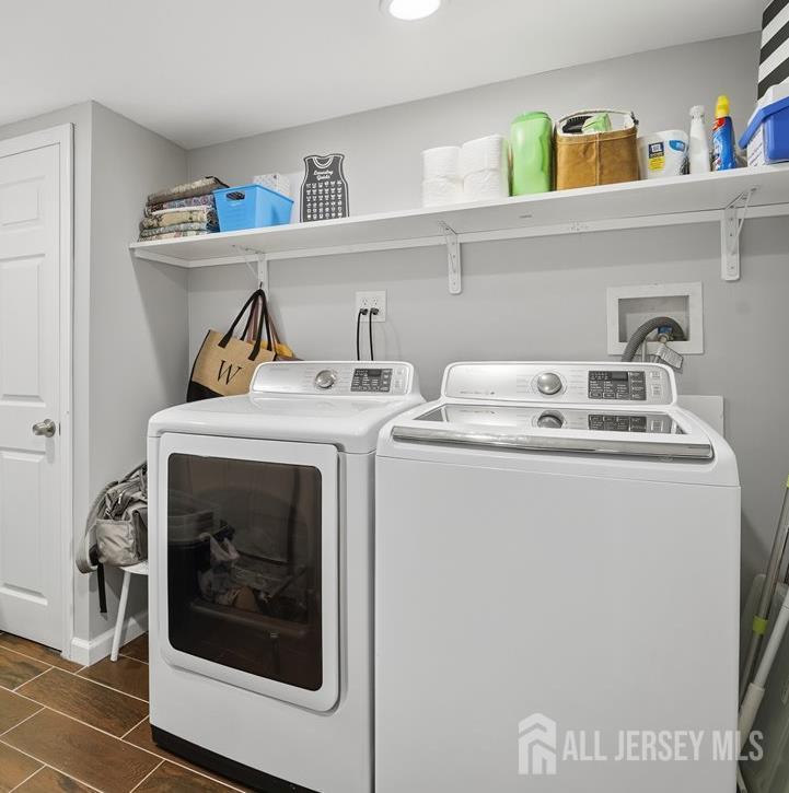 10 Maplehurst Lane Piscataway, NJ 08854 - Photo 23 of 28 a utility room with dryer and washer