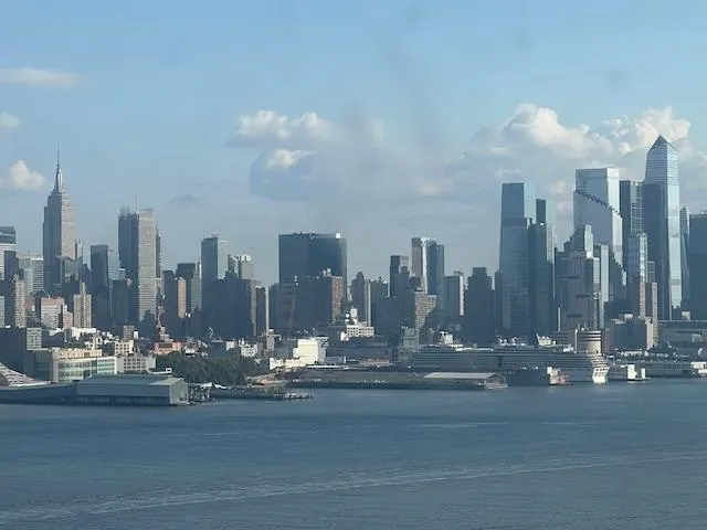 a view of a city with tall buildings