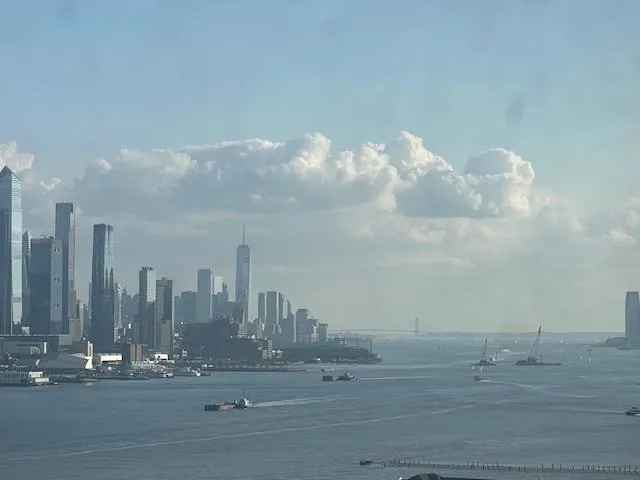 a view of a city with tall buildings