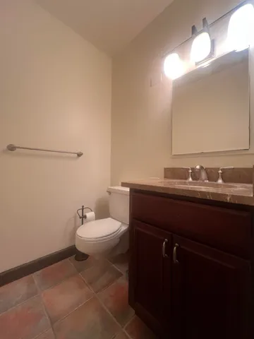 a bathroom with a sink and a toilet
