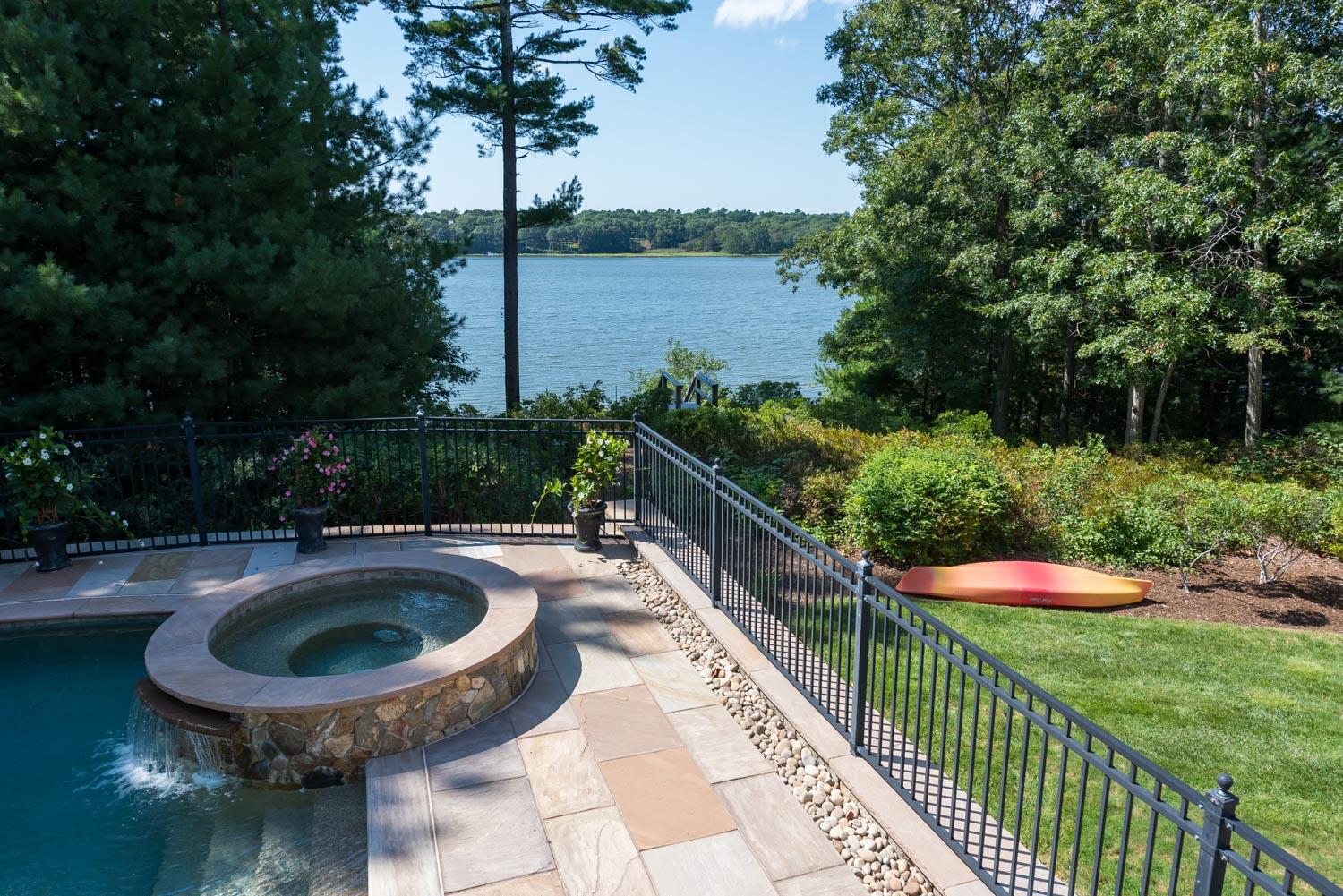 172 Bay Road Cotuit, MA 02635 - Photo 30 of 36 a view of swimming pool from a balcony