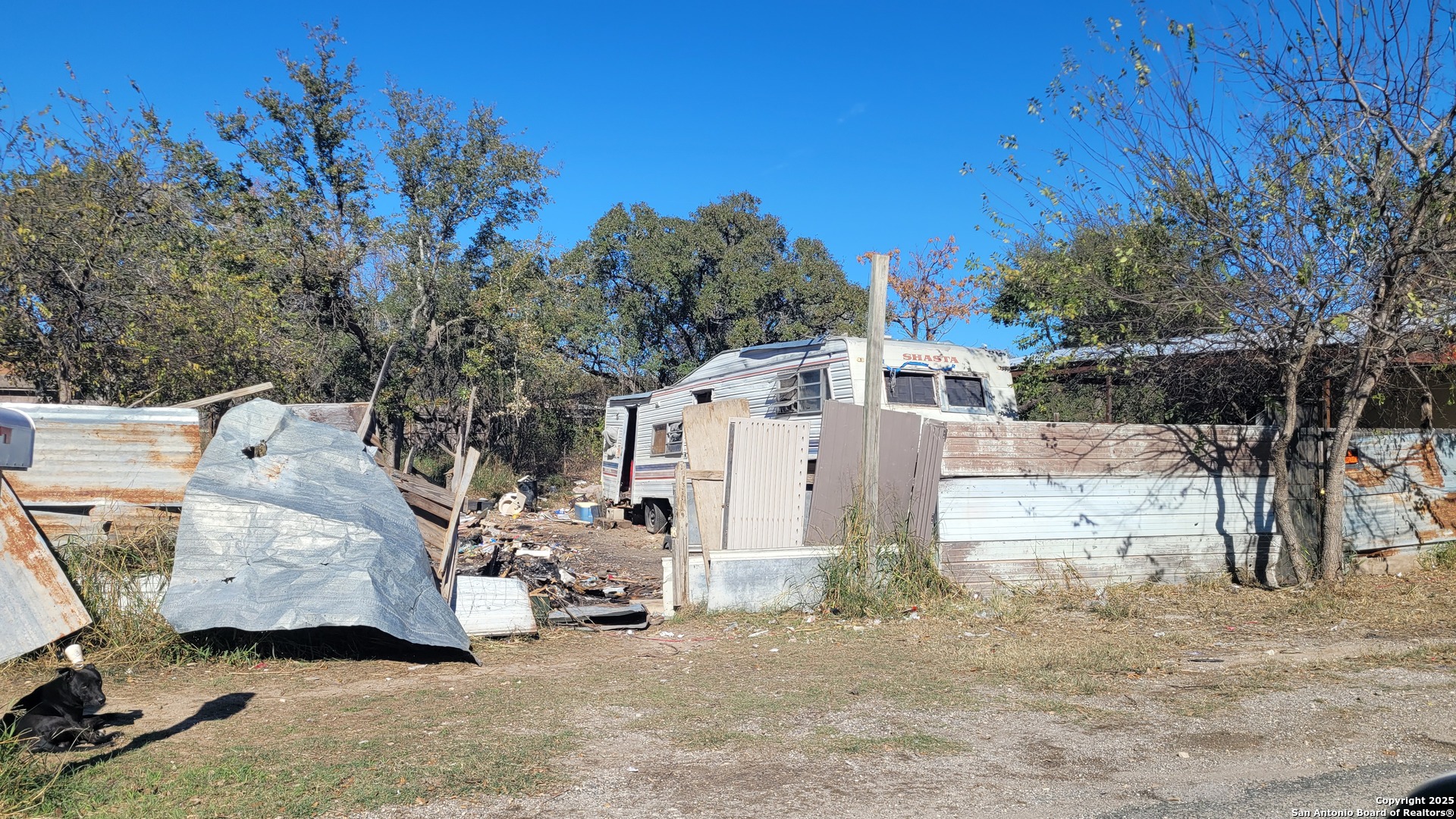 126 Viewpoint Drive Poteet, TX 78065 - Photo 2 of 6 a view of a house with a yard