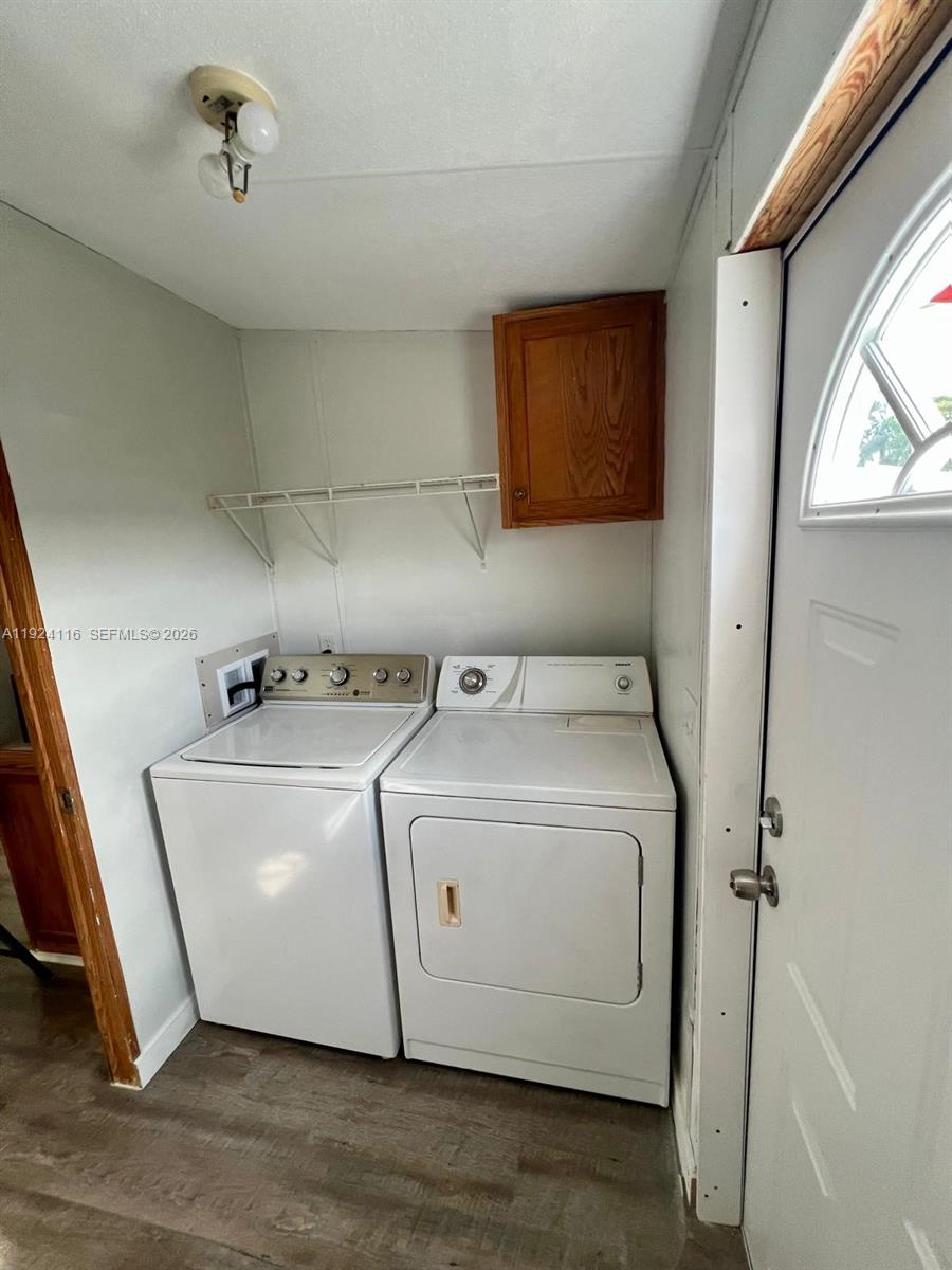 35303 Southwest 180th Avenue, Unit 399 Homestead, FL 33034 - Photo 14 of 16 a utility room with dryer and washer