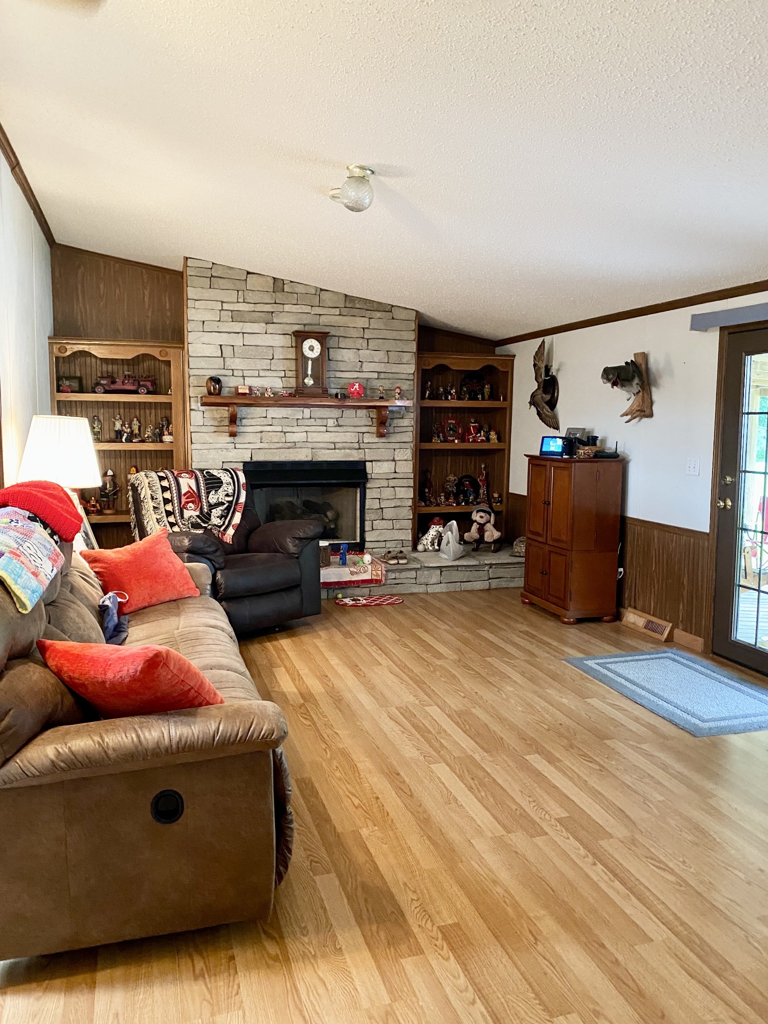 10000 Clydeton Road Waverly, TN 37185 - Photo 11 of 26 a living room with furniture and a fireplace