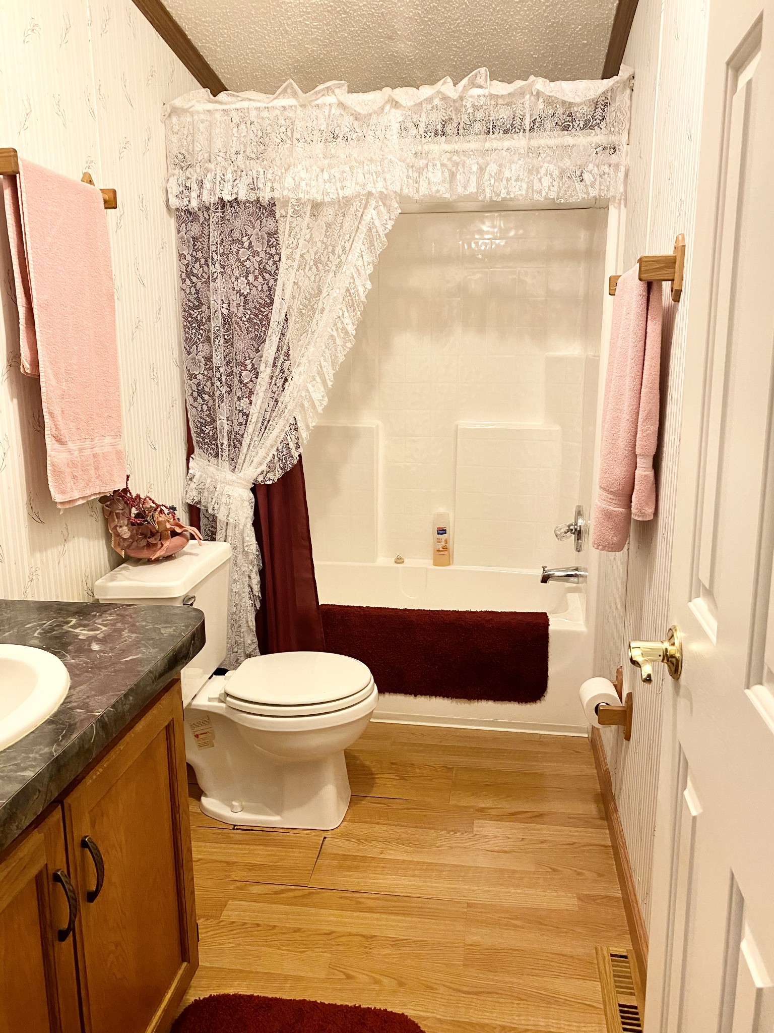 10000 Clydeton Road Waverly, TN 37185 - Photo 21 of 26 a bathroom with a granite countertop toilet sink and mirror