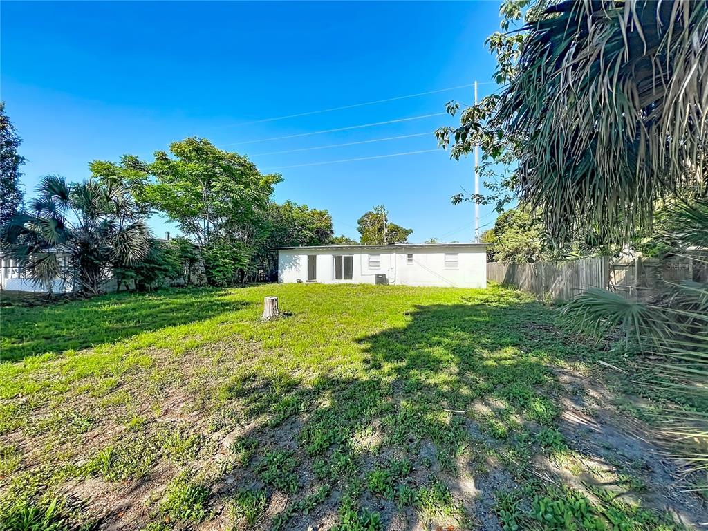 2001 Conway Gardens Road Orlando, FL 32812 - Photo 11 of 11 a view of house with a big yard