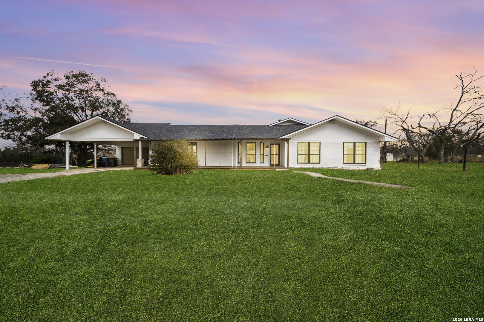 a house view with a garden space