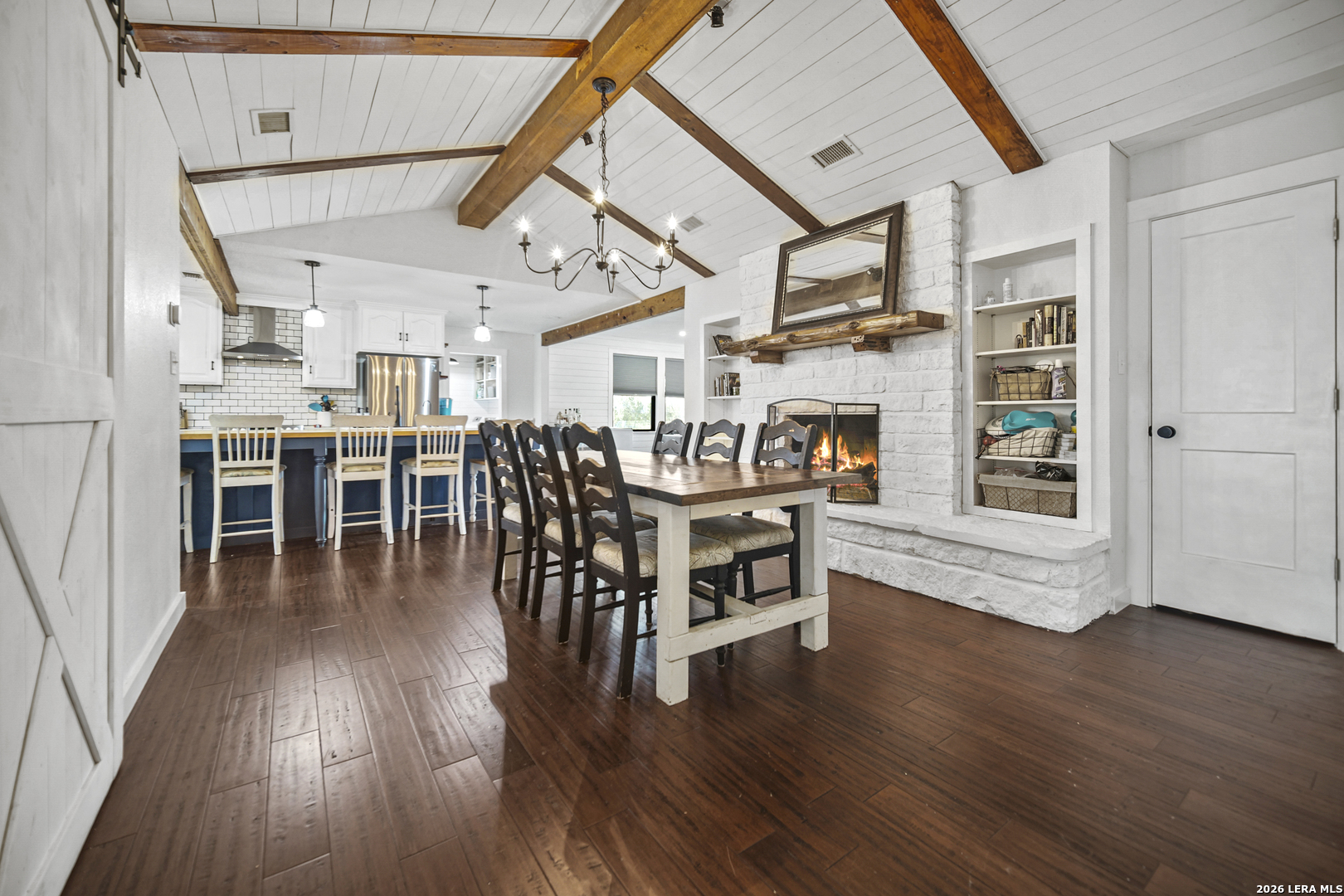25 Poehnert Road Boerne, TX 78006 - Photo 16 of 37 a view of a dining room with furniture and wooden floor