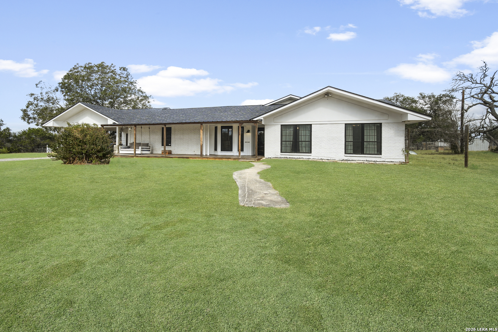 25 Poehnert Road Boerne, TX 78006 - Photo 3 of 37 a front view of house with yard and green space