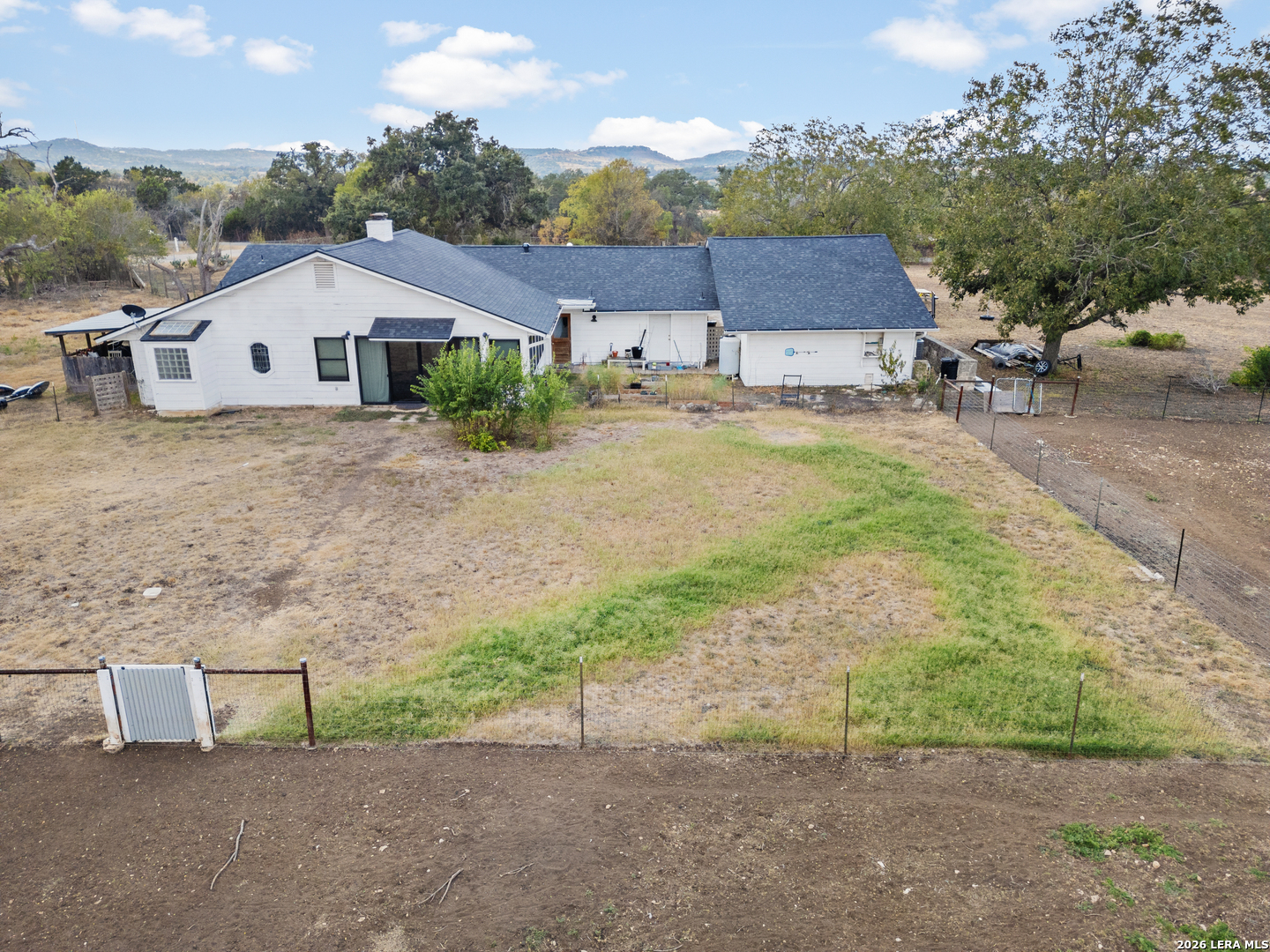 25 Poehnert Road Boerne, TX 78006 - Photo 33 of 37 a aerial view of a house next to a yard