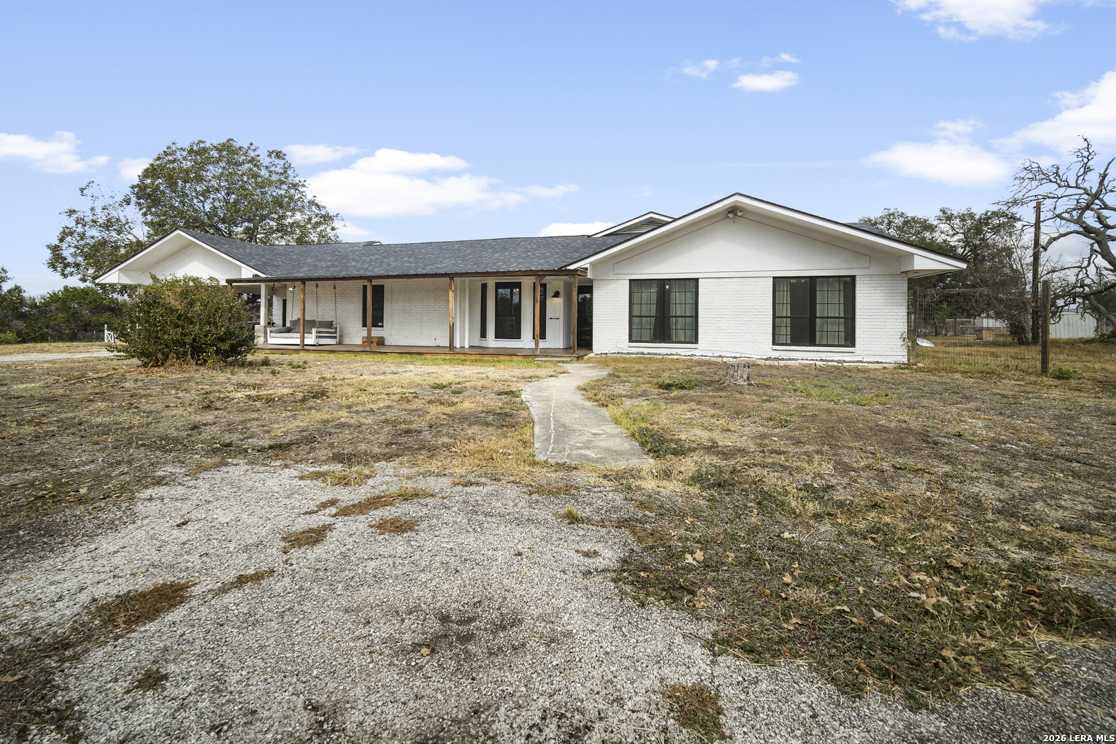 25 Poehnert Road Boerne, TX 78006 - Photo 4 of 37 a front view of house with yard and trees