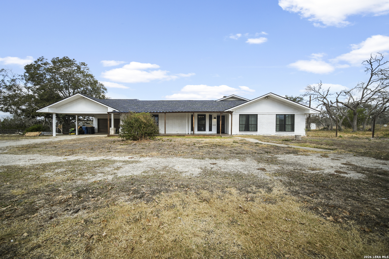 25 Poehnert Road Boerne, TX 78006 - Photo 6 of 37 a front view of a house with a garden