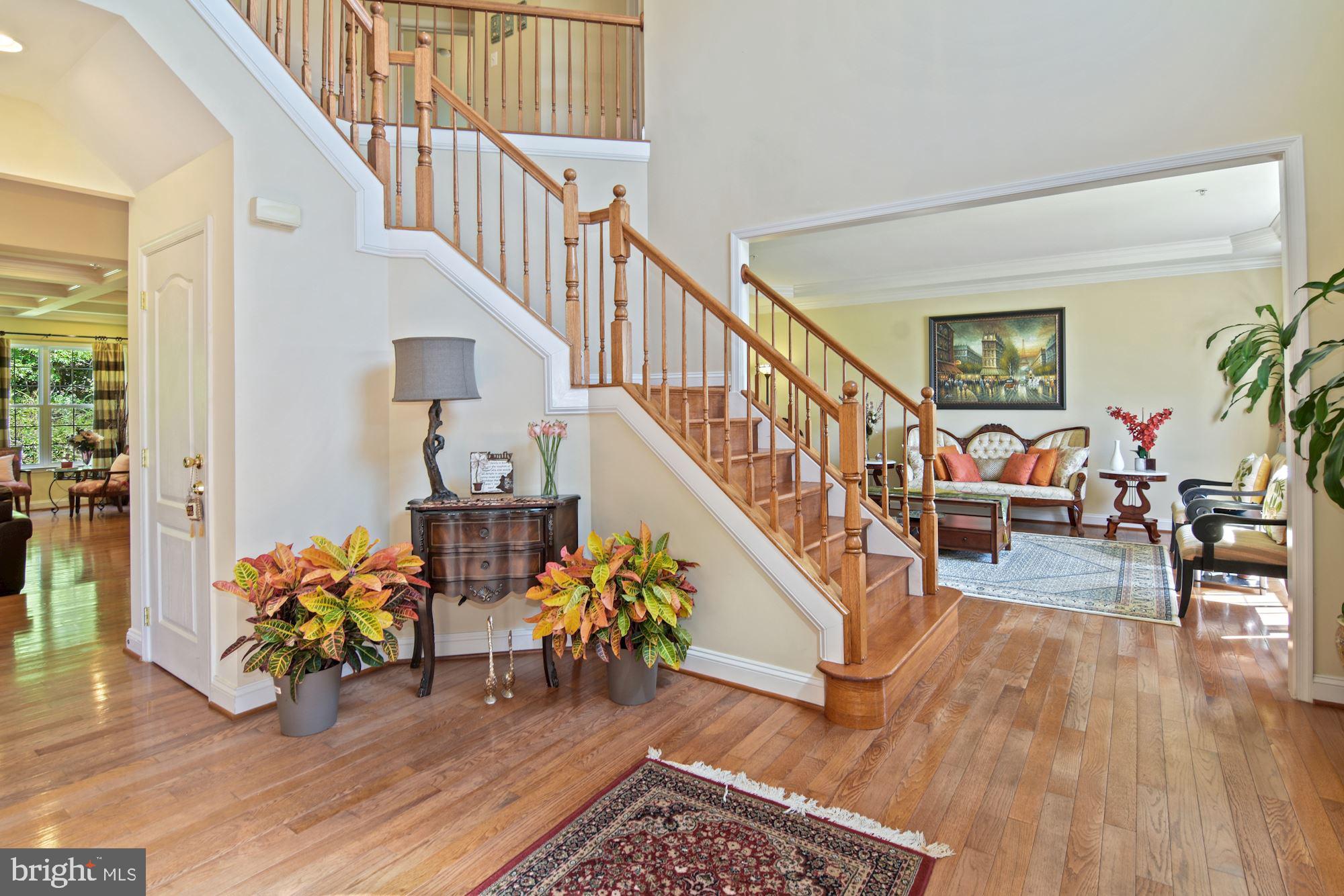 6803 Ironbridge Lane Laurel, MD 20707 - Photo 3 of 60 Beautiful wood staircase in front foyer
