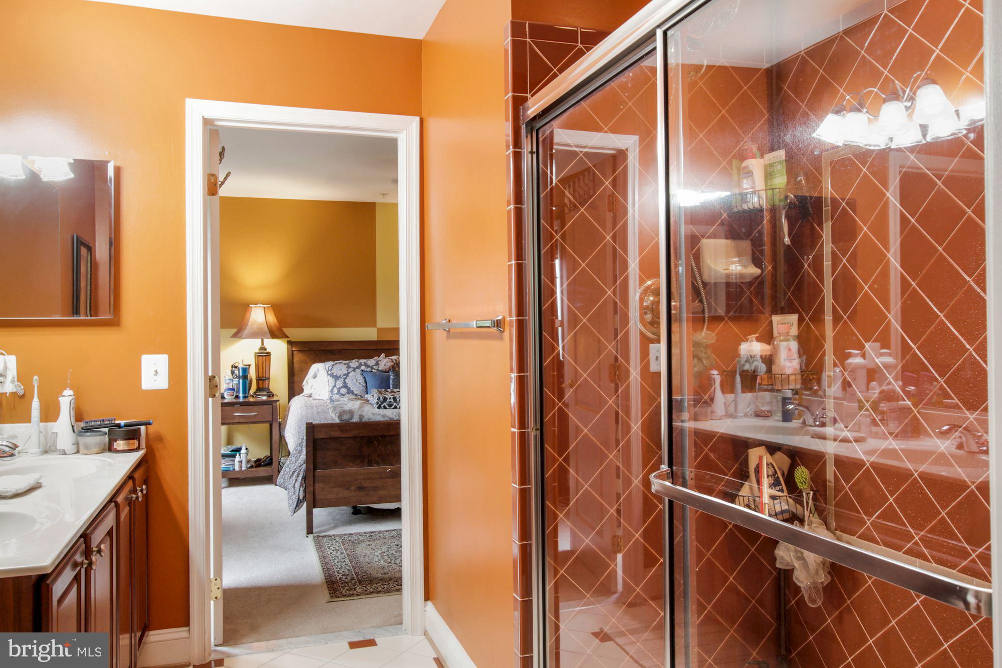 6803 Ironbridge Lane Laurel, MD 20707 - Photo 36 of 60 Nice bathroom with enclosed shower