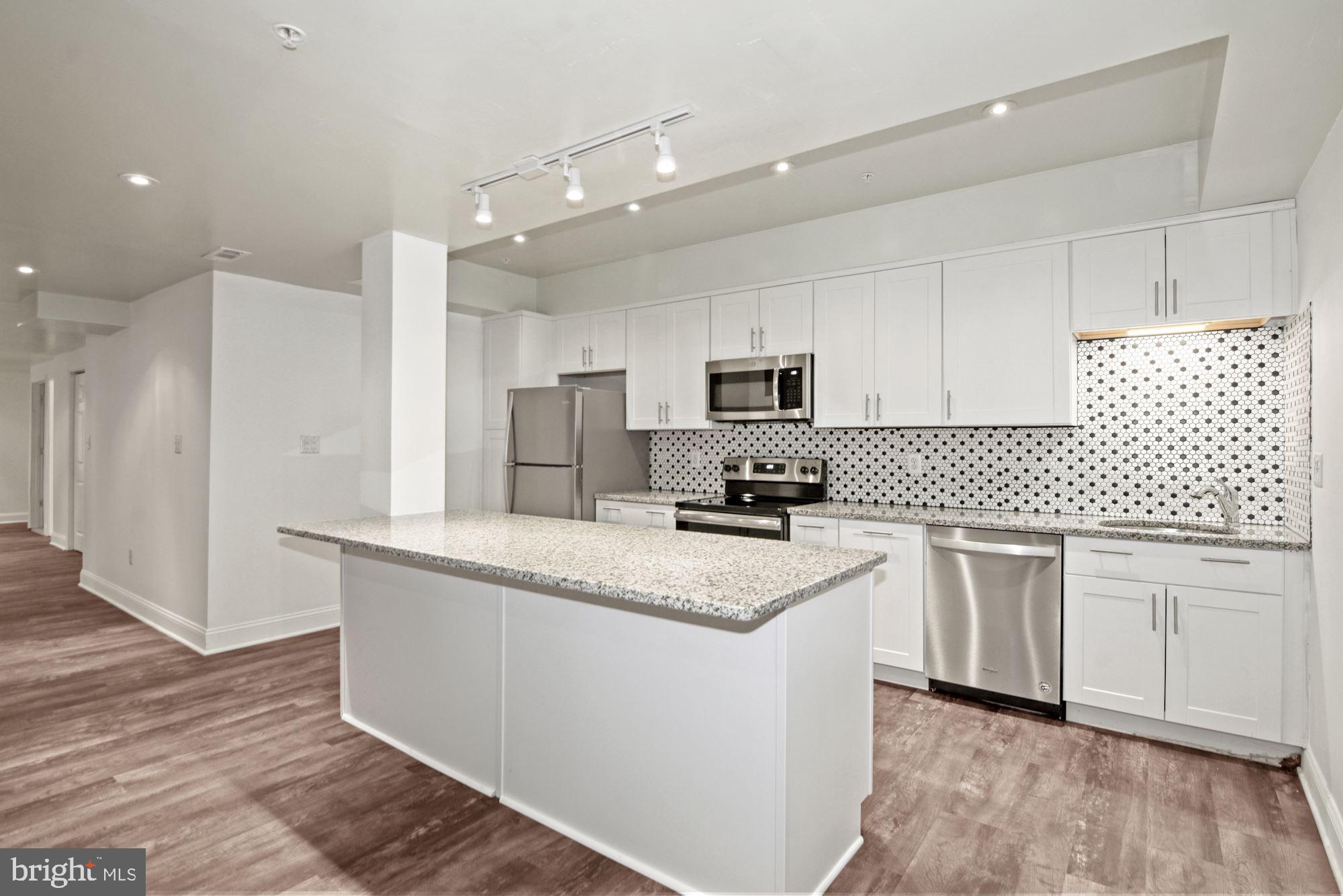 6803 Ironbridge Lane Laurel, MD 20707 - Photo 39 of 60 New kitchen in basement