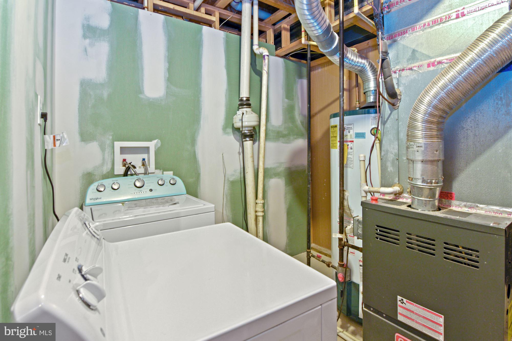 6803 Ironbridge Lane Laurel, MD 20707 - Photo 51 of 60 New Washer and dryer in lower level basement