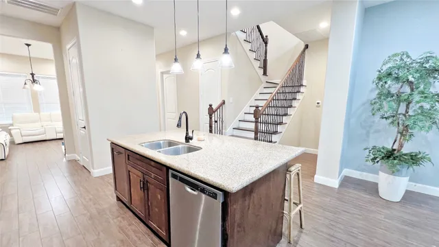 a kitchen with a table and chairs