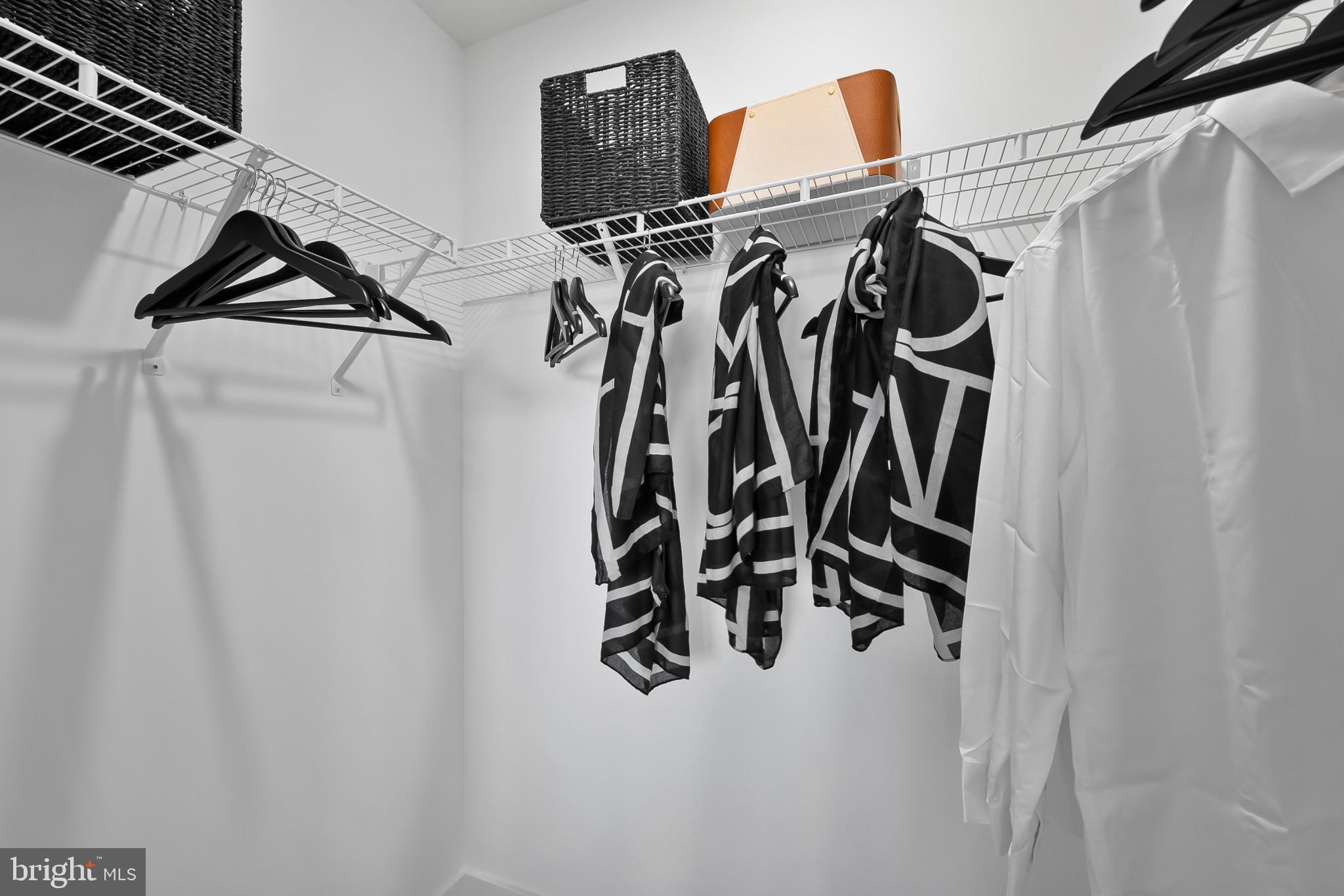 40 Aloma Street Ranson, WV 25438 - Photo 26 of 46 a view of walk in closet with clothes