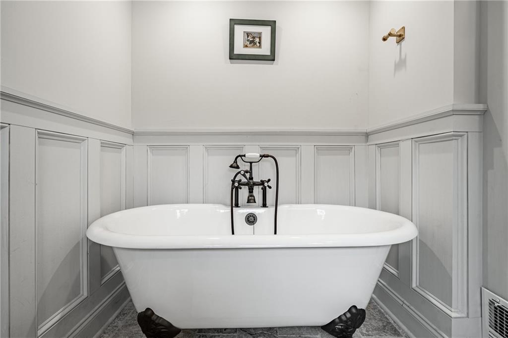 701 Oakbourne Road West Chester, PA 19382 - Photo 24 of 50 a white bath tub sitting in a bathroom